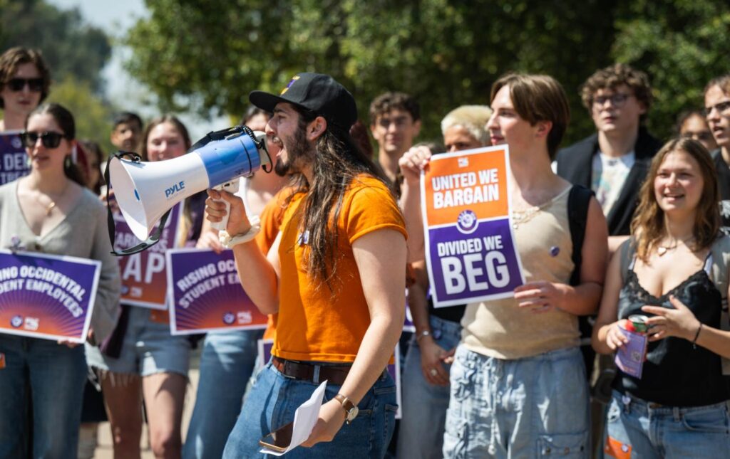 Student workers and their supporters at Occidental College as they launch a union campaign to join SEIU Local 721 in 2024. A sign reads: "United we bargain. Divided we beg."